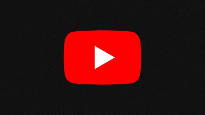 The red YouTube logo on a grainy black background