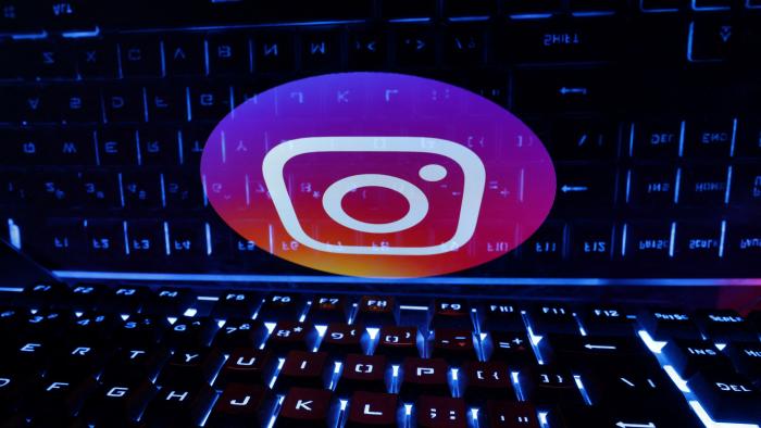 FILE PHOTO: A keyboard is placed in front of a displayed Instagram logo in this illustration taken February 21, 2023. REUTERS/Dado Ruvic/Illustration/File Photo