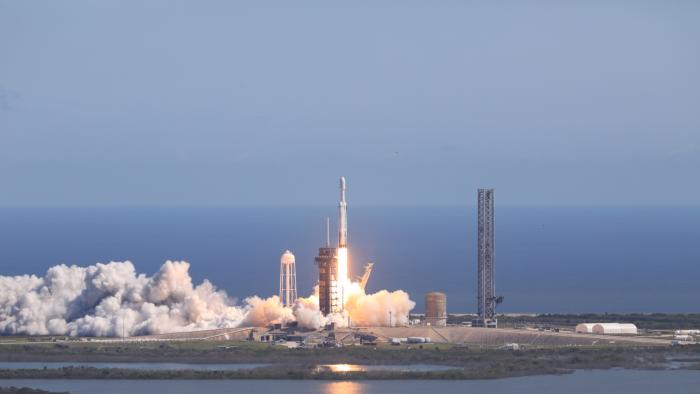 A rocket blasting off.
